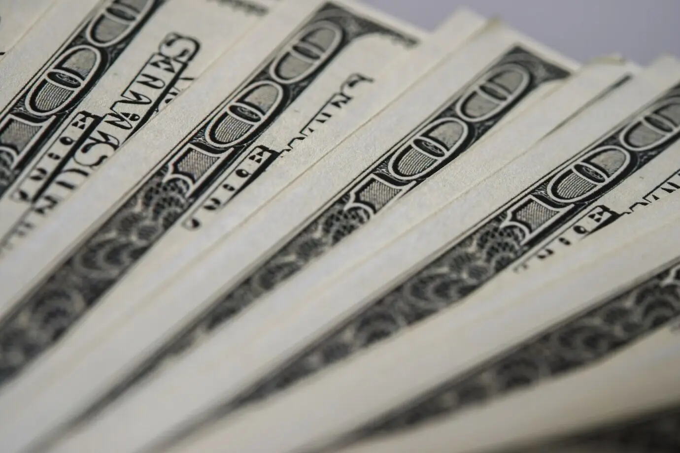 Billie dollar against a money background.